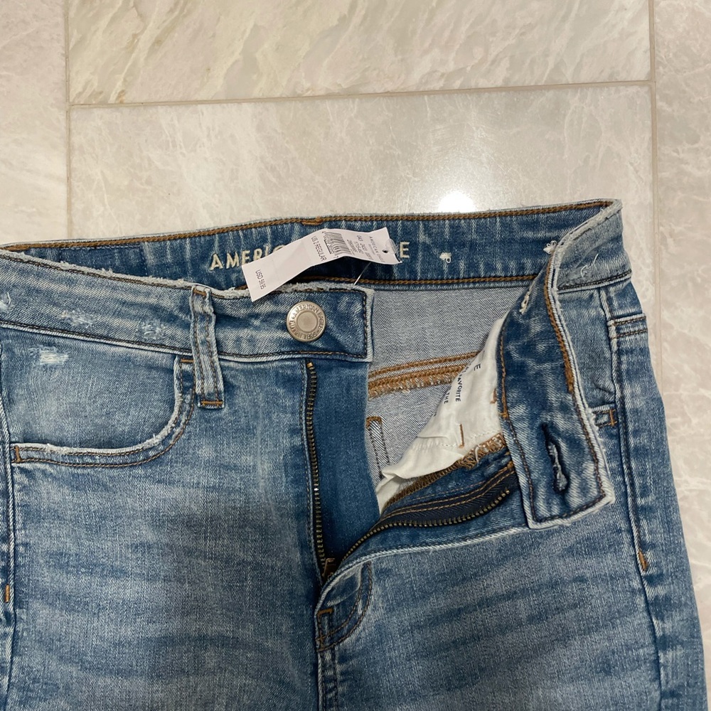 Blue ripped jeans